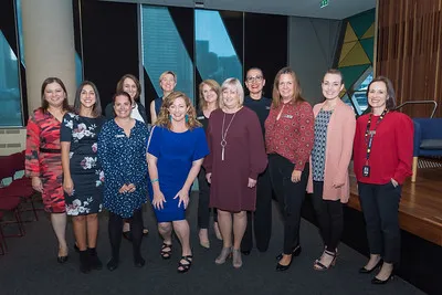 A group of women at a formal event