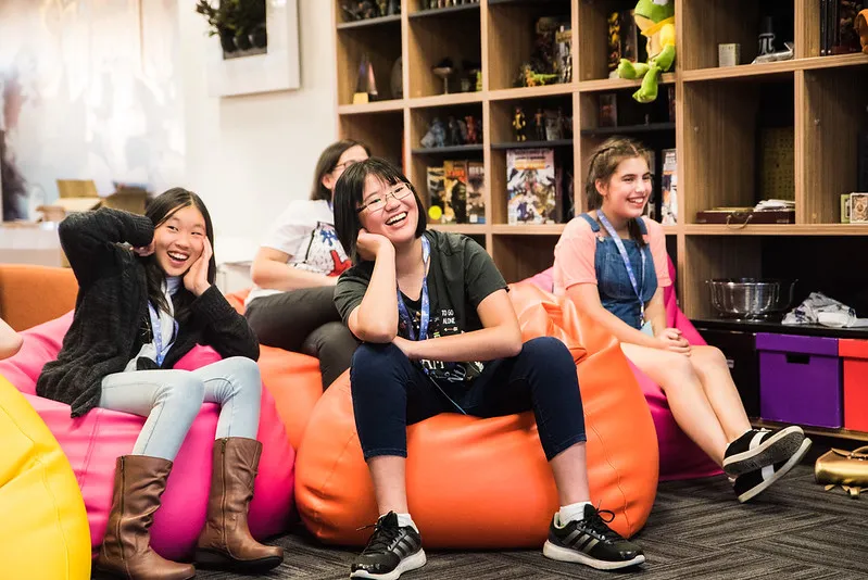 Participants chatting on beanbags